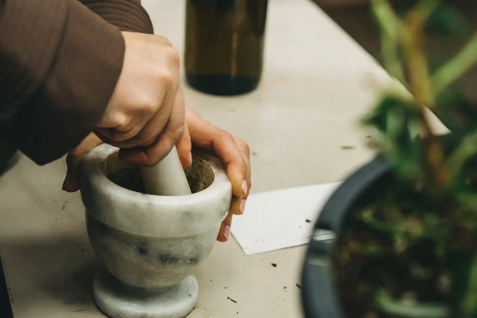 white and black mortar and pestle